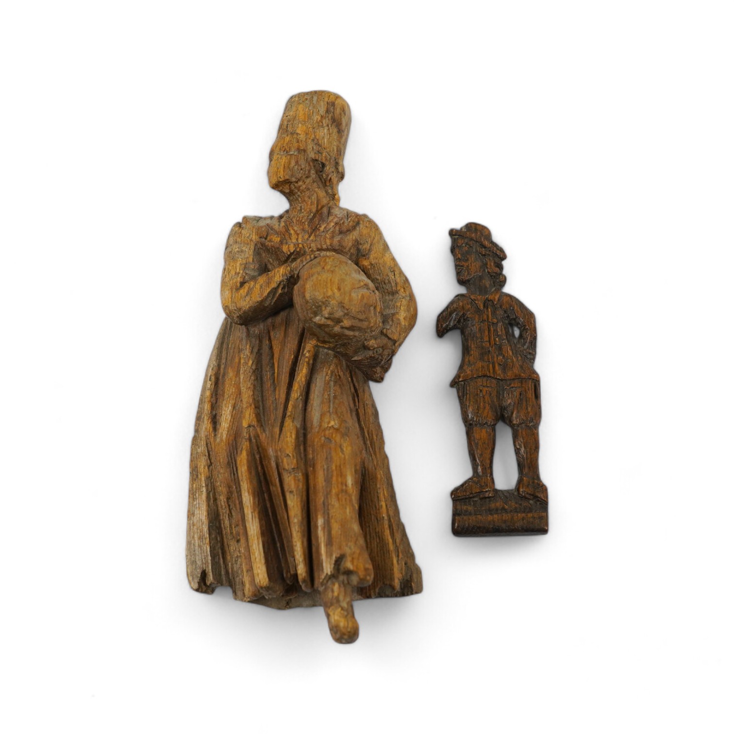 Two 17th century or earlier, European carved oak figures, tallest 20cm high. Condition - fair considering age